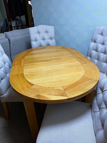 Round light wood dining table - light,